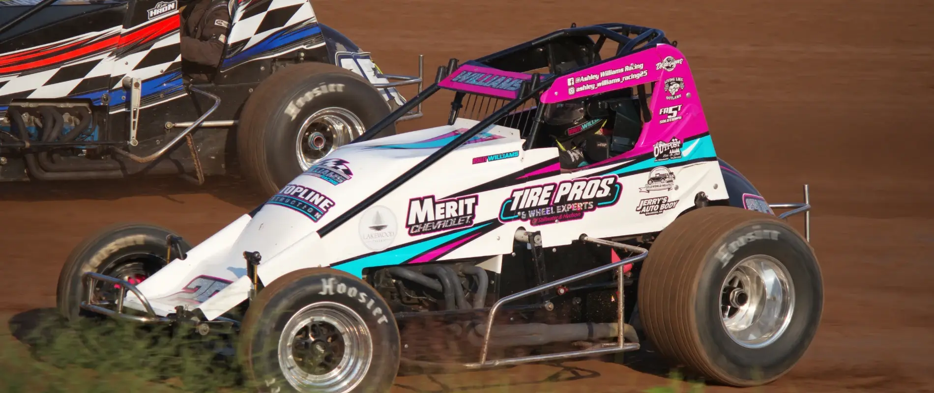 Ashley Williams racing No. 25 sprint car on dirt oval against competitor